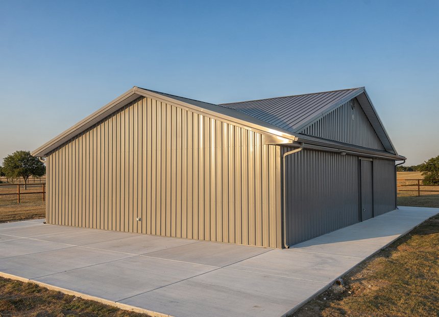 Custom red-iron metal building built on site in Houston, TX